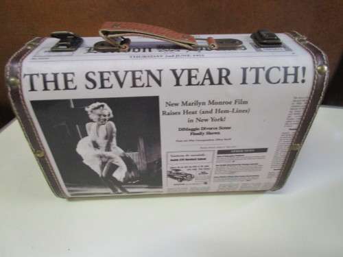 A MARVELOUS LITTLE SUITCASE WITH Marilyn Monroe NEWS PAPER PRINTS ON