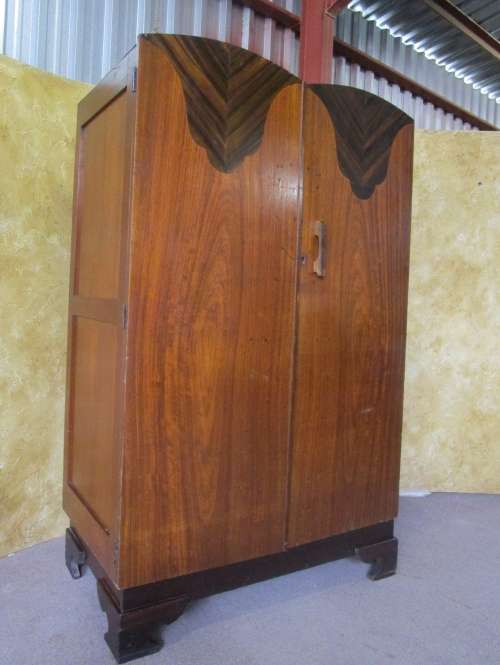 A MARVELOUS TWO DOOR WARDROBE WITH STUNNING DETAIL ON THE DOOR