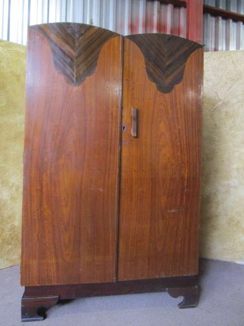 A MARVELOUS TWO DOOR WARDROBE WITH STUNNING DETAIL ON THE DOOR