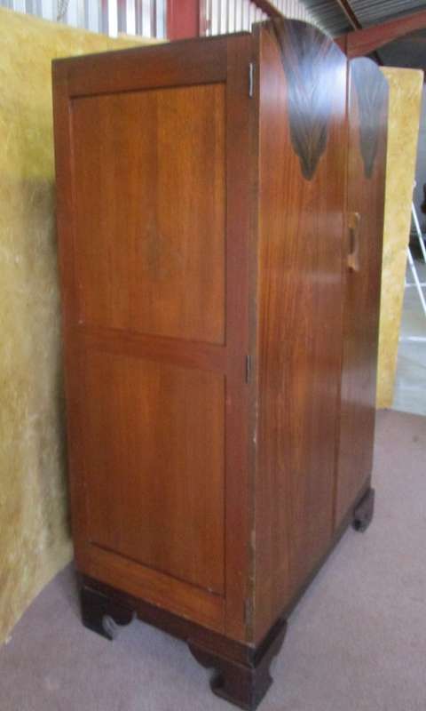 A MARVELOUS TWO DOOR WARDROBE WITH STUNNING DETAIL ON THE DOOR