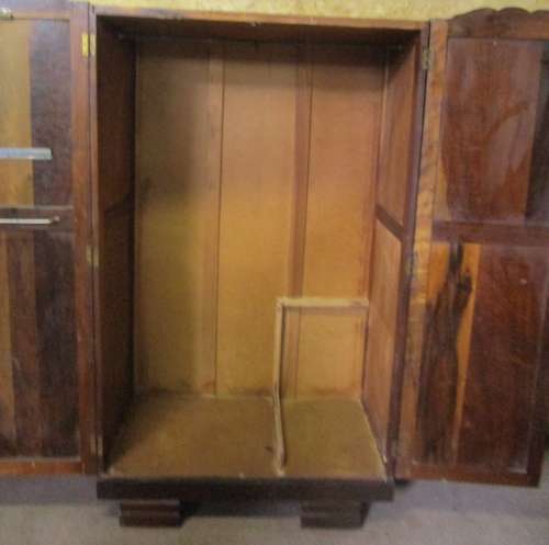 A MARVELOUS VINTAGE IMBUIA TWO DOOR WARDROBE WITH STUNNING DETAILED LEGS