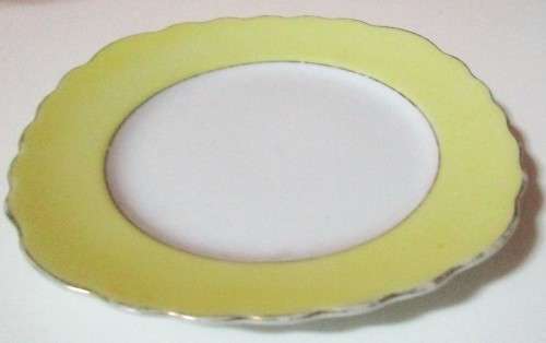 A STUNNING BONE CHINA PORCELAIN SIDE PLATE BY BOUQUET - HAND PAINTED