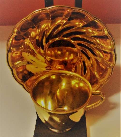 ELGANT & STYLISH A GOLDEN COLOR PORCELAIN CUP & SAUCER - FABULOUS