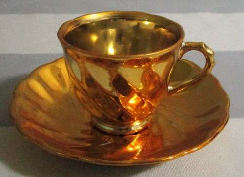 ELGANT & STYLISH A GOLDEN COLOR PORCELAIN CUP & SAUCER - FABULOUS