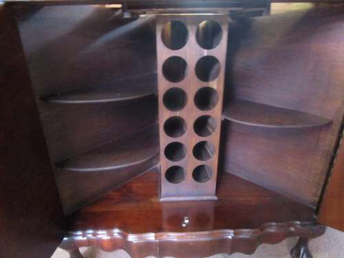 AN INCREDIBLE (LARGER) SOLID IMBUIA FOUR DOOR BALL AND CLAW CORNER LIQOUR CABINET WITH A LIGHT INSID