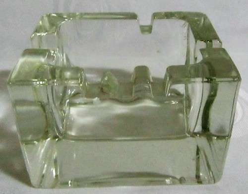 A FANTASTIC HEAVY CLEAR GLASS ASHTRAY