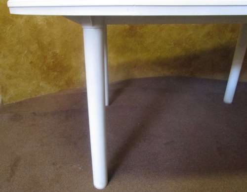 A OVAL SIX SEATER OUSIDE TABLE - LEGS CAN PULL OUT FOR EASY STORAGE