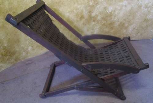 WOW A A LOVLEY LARGE WOODEN LOUNGER CHAIR WITH WEAVED BLOCKS FOR THE SEAT