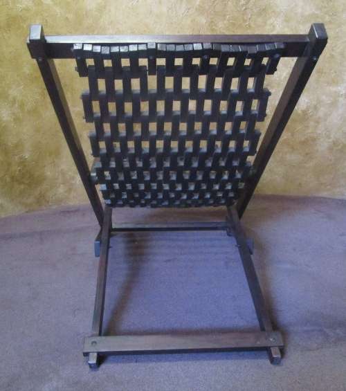 WOW A A LOVLEY LARGE WOODEN LOUNGER CHAIR WITH WEAVED BLOCKS FOR THE SEAT