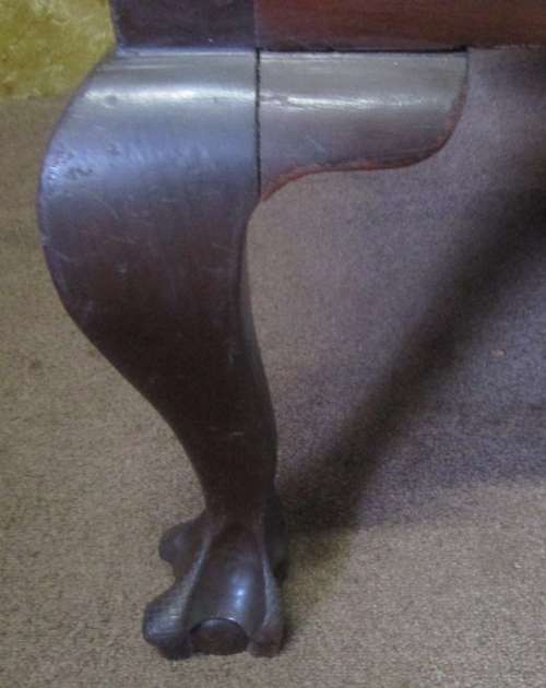 A beautiful solid Wood Ball & Claw parlour couch with wicker backrest in great condition!!!