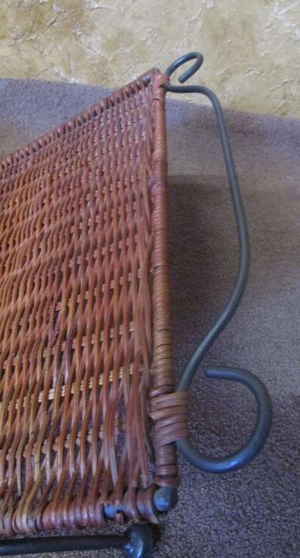 A LOVLEY WEAVED CANE AND METAL FOLD UP MAGAZINE RACK
