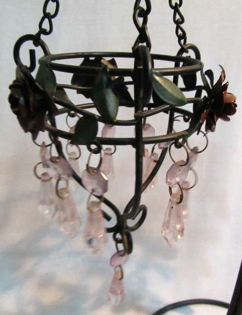 A BEAUTIFUL DESIGNED THREE TIER CANDLE HOLDER WITH STUNNING DETAIL