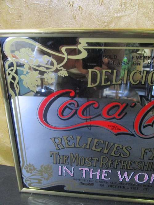 A STUNNING VINTAGE COCA COLA FRAMED MIROR 38CM X 28CM