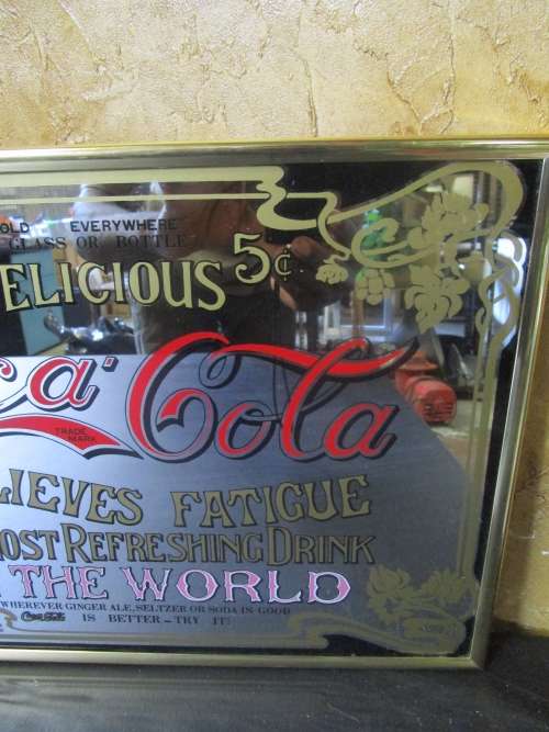 A STUNNING VINTAGE COCA COLA FRAMED MIROR 38CM X 28CM