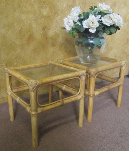 TWO LOVLEY CANE SIDE TABLES WITH GLASS TOPS PERFECT FOR THE PATION - BID PER EACH