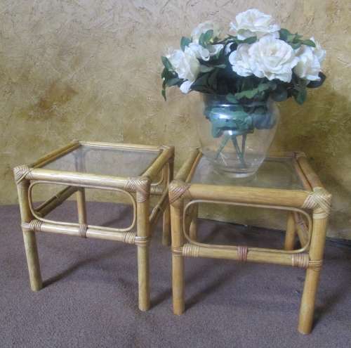 TWO LOVLEY CANE SIDE TABLES WITH GLASS TOPS PERFECT FOR THE PATION - BID PER EACH