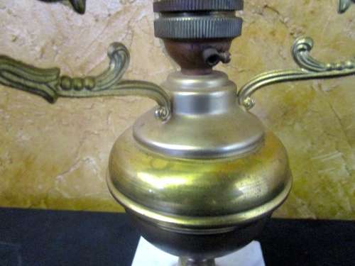 This is a gorgeous brass lamp with a large finial and a marble base