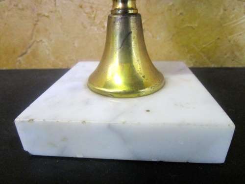 This is a gorgeous brass lamp with a large finial and a marble base