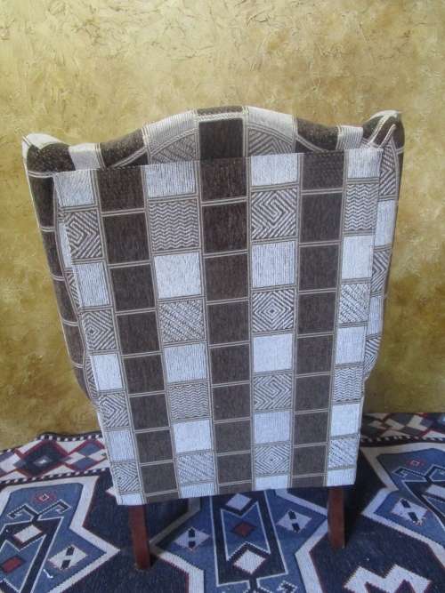A CHARMING COMFORTABLE WING BACK CHAIR IN EXCELLENT CONDITION