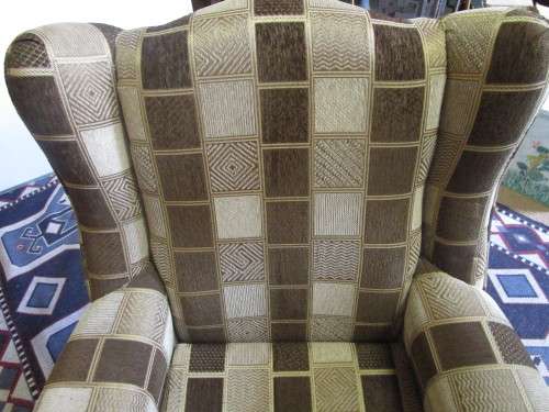 A CHARMING COMFORTABLE WING BACK CHAIR IN EXCELLENT CONDITION