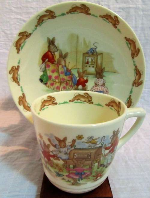 This is a "Bunnykins" child's mug and saucer set by Royal Doulton China. The set is perfect