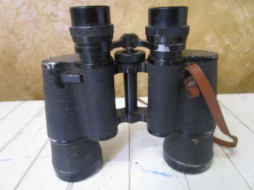 A Vintage atlas coated binoculars 7x50