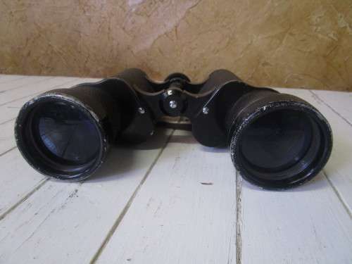A Vintage atlas coated binoculars 7x50