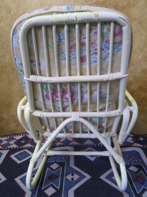 A BEAUTIFUL ROCKING CHAIR PERFECT FOR A BABY ROOM OR THAT SPECIAL SUN CORNER