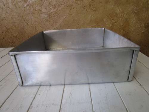 A LARGE SQUARE BAKING TIN