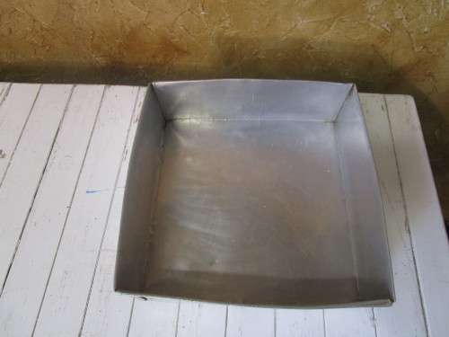 A LARGE SQUARE BAKING TIN