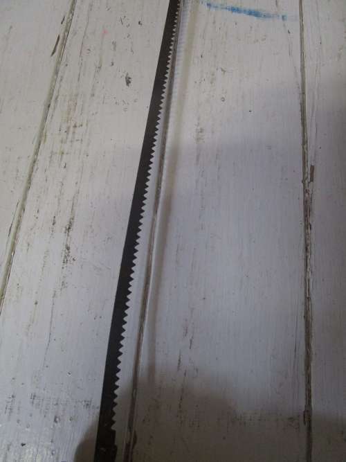 A lovely antique bow cut saw in wonderfully weathered condition with a great primitive look and feel