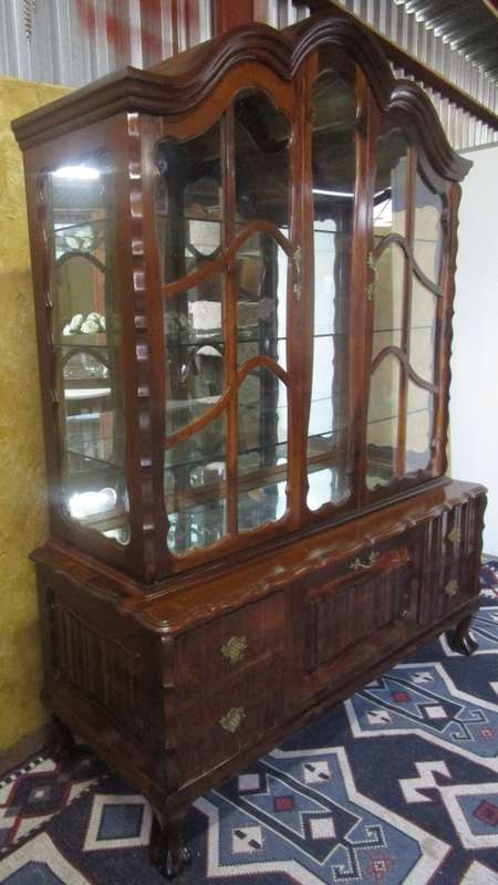 Spectacular large "gabled" ball and claw display cabinet with glass shelves and four drawers & door