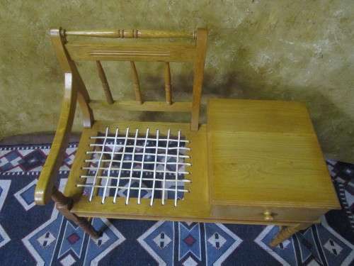A MARVELOUS VINTAGE OAK TELEPHONE TABLE WITH RIEMPIES STUNNING PIECE