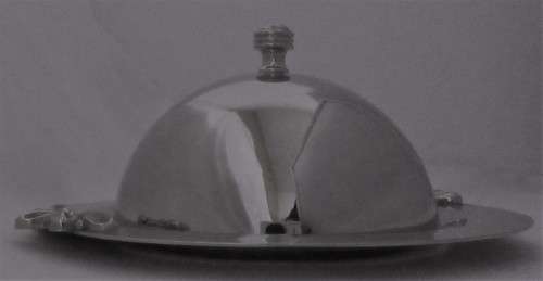 AN EXQUISITE SILVER PLATED BUTTER DISH FOR STYLISH DINNER EVENING