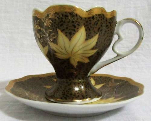 Gorgeous Lily Porcelain Tea Cup and Saucer.  Dark Rich brown with Stunning Gold Detail.