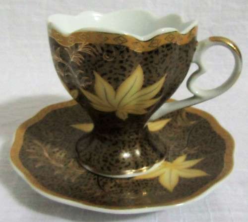 Gorgeous Lily Porcelain Tea Cup and Saucer.  Dark Rich brown with Stunning Gold Detail.