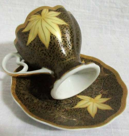 Gorgeous Lily Porcelain Tea Cup and Saucer.  Dark Rich brown with Stunning Gold Detail.