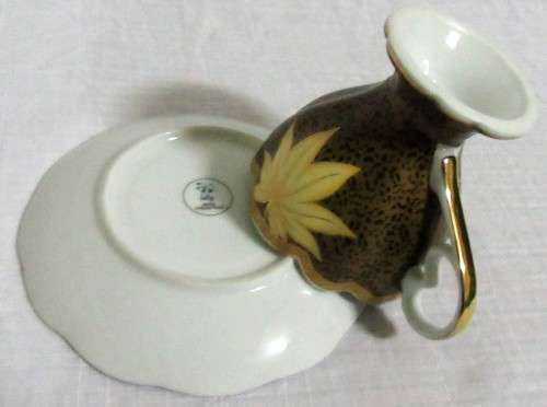 Gorgeous Lily Porcelain Tea Cup and Saucer.  Dark Rich brown with Stunning Gold Detail.