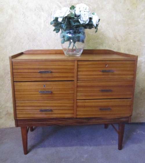 This 6 drawer Vintage piece can be used as a stunning small console for your television, or a buffet