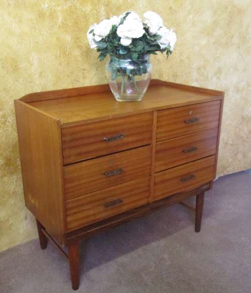 This 6 drawer Vintage piece can be used as a stunning small console for your television, or a buffet