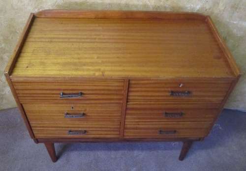 This 6 drawer Vintage piece can be used as a stunning small console for your television, or a buffet