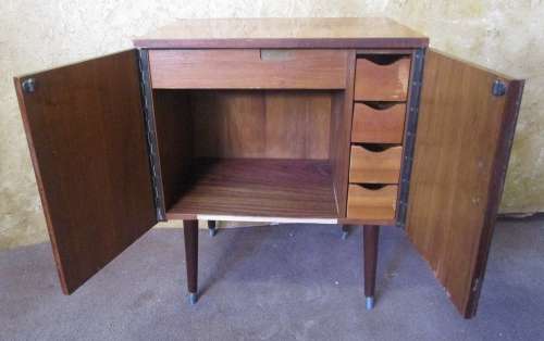 A MARVELOUS VINTAGE TWO DOOR CABINET WITH FOUR DRAWERS - PERFECT FOR ALL YOUR CRAFT APPLIANCES