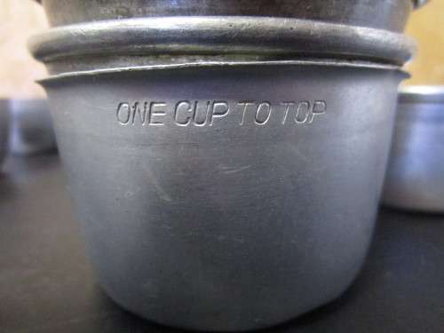 A JOBLOT OF SOUFFLE STAINLESS STEEL BAKING RAMEKINS ONE BID FOR ALL