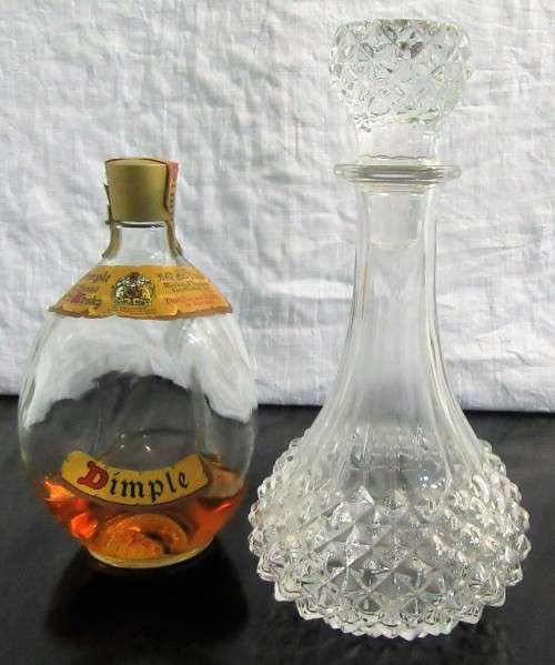 This a beautiful Crystal? decanter. It is heavy Piece with lovely detail - true Elegance  & Style.!