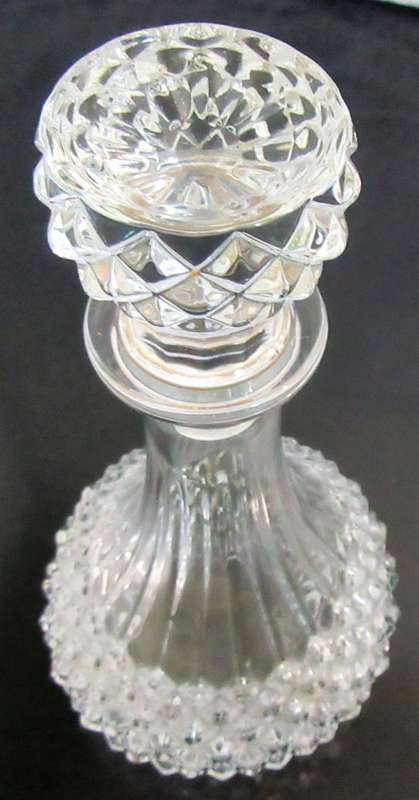 This a beautiful Crystal? decanter. It is heavy Piece with lovely detail - true Elegance  & Style.!