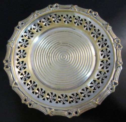 A lovely Silver plated tray on Brass. The Brass starts to show fantastic Patina with a ornate scrole