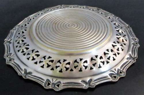 A lovely Silver plated tray on Brass. The Brass starts to show fantastic Patina with a ornate scrole