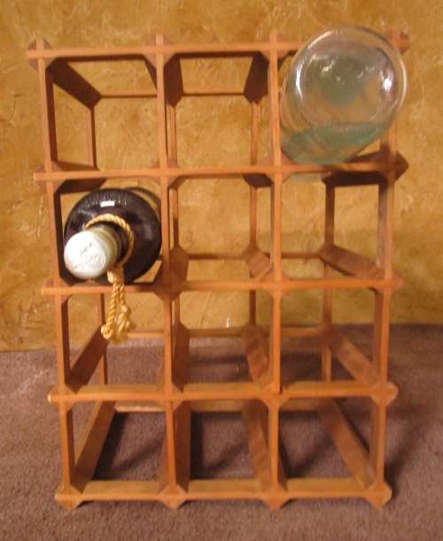 A GOOD SIZE WINE RACK FOR THE KITCHEN OR PUB OR DRINKING TROLLEY ON THE PATIO