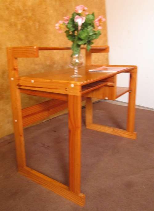 A LOVELY SOLLID WOOD DESK WITH A PULL OUT TRAY FOR YOUR KEYBOARD