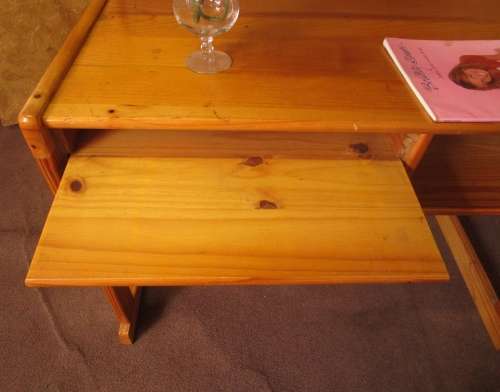 A LOVELY SOLLID WOOD DESK WITH A PULL OUT TRAY FOR YOUR KEYBOARD